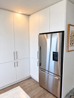 Fridge and cabinetry — after